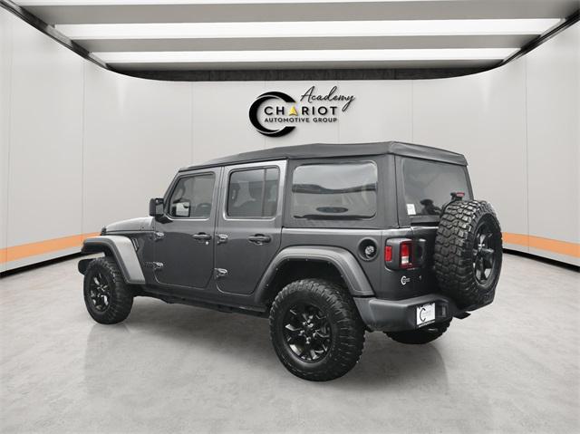 used 2021 Jeep Wrangler Unlimited car, priced at $32,544