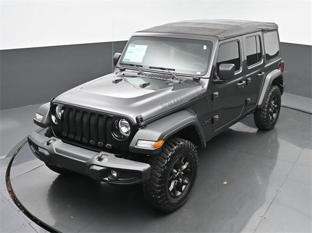 used 2021 Jeep Wrangler Unlimited car, priced at $32,544