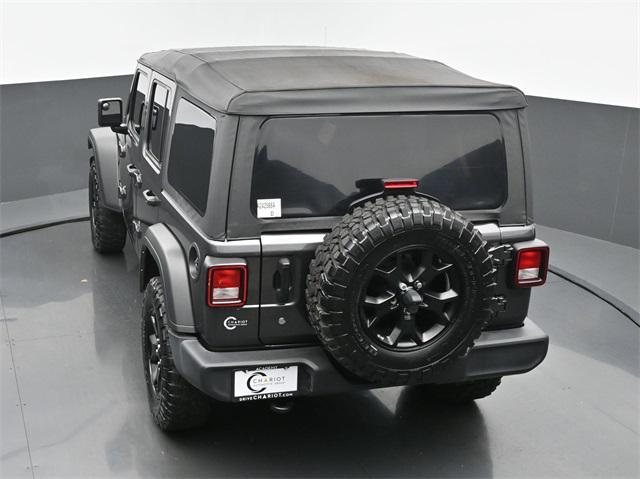 used 2021 Jeep Wrangler Unlimited car, priced at $32,544