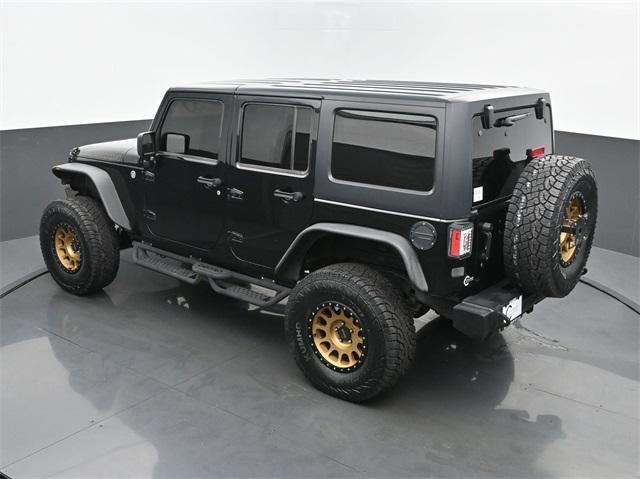 used 2013 Jeep Wrangler Unlimited car, priced at $23,995