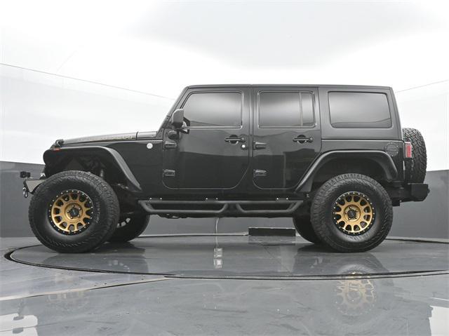 used 2013 Jeep Wrangler Unlimited car, priced at $23,995