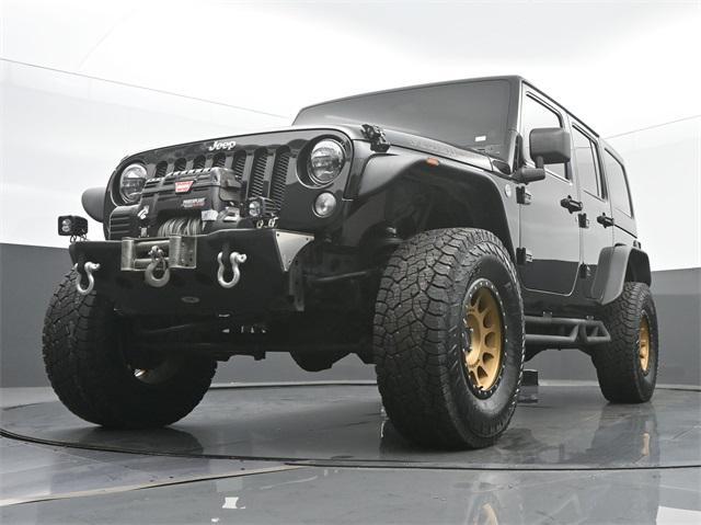 used 2013 Jeep Wrangler Unlimited car, priced at $23,995