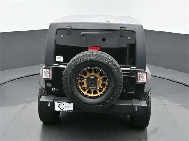 used 2013 Jeep Wrangler Unlimited car, priced at $23,995