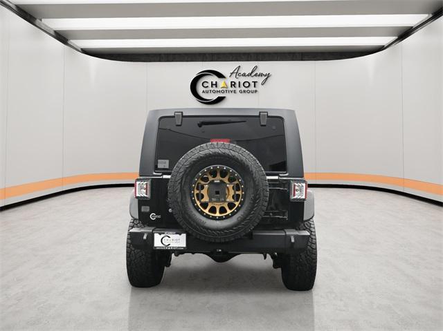 used 2013 Jeep Wrangler Unlimited car, priced at $23,995