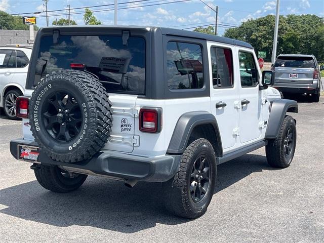 used 2021 Jeep Wrangler Unlimited car, priced at $27,871