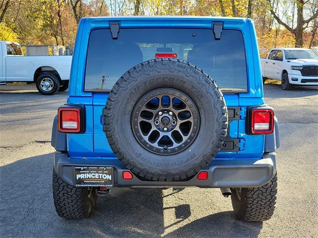 used 2022 Jeep Wrangler Unlimited car, priced at $38,855