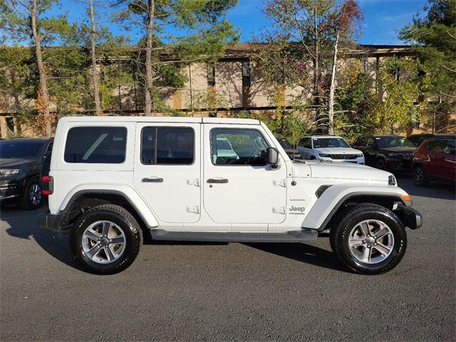 used 2021 Jeep Wrangler Unlimited car, priced at $34,697