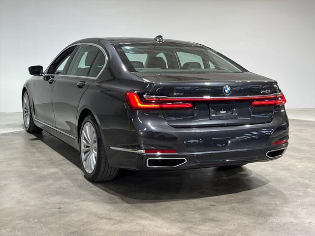used 2022 BMW 740 car, priced at $46,352