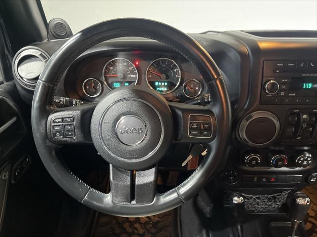 used 2013 Jeep Wrangler Unlimited car, priced at $15,995