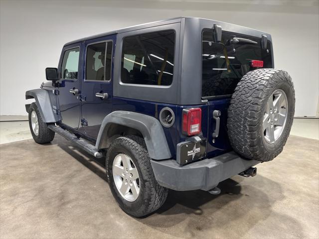 used 2013 Jeep Wrangler Unlimited car, priced at $15,995