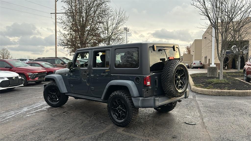 used 2016 Jeep Wrangler Unlimited car, priced at $22,556