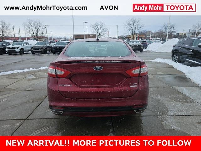 used 2016 Ford Fusion car, priced at $12,500