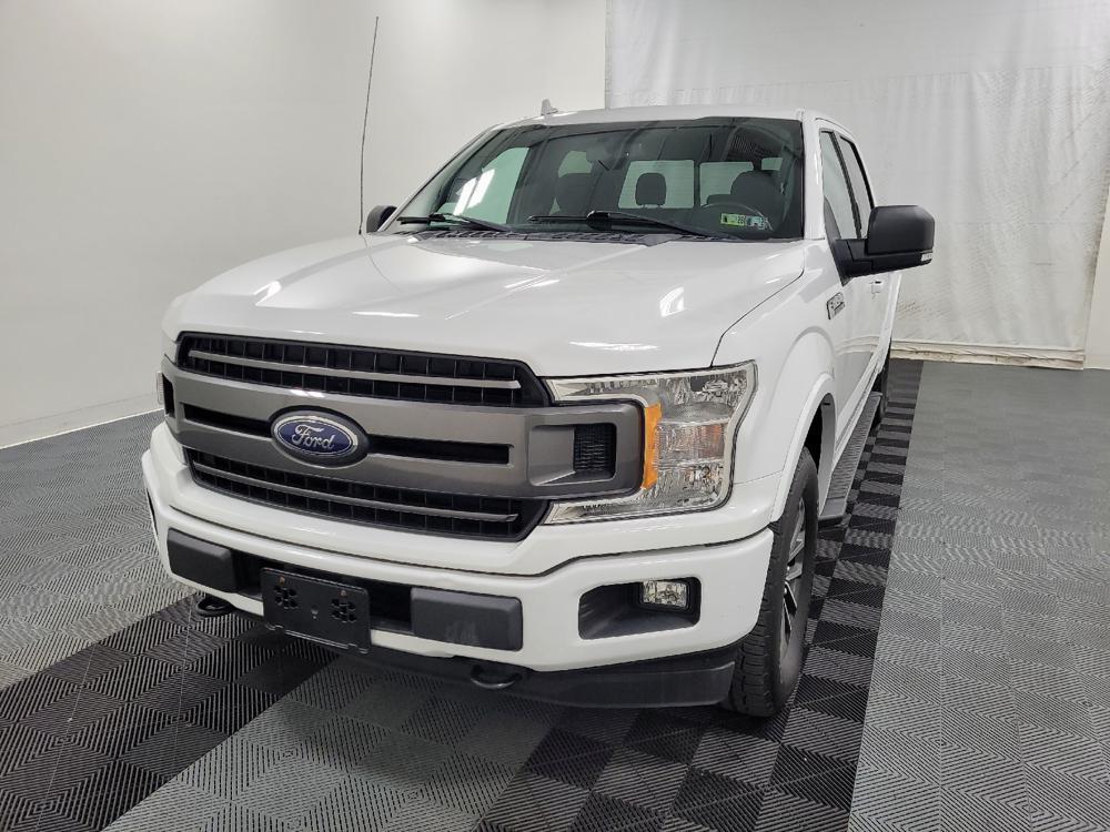used 2018 Ford F-150 car, priced at $28,395