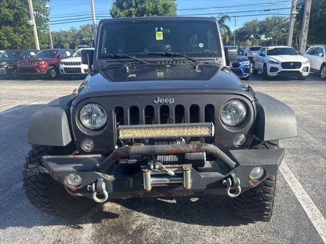 used 2016 Jeep Wrangler Unlimited car, priced at $14,988
