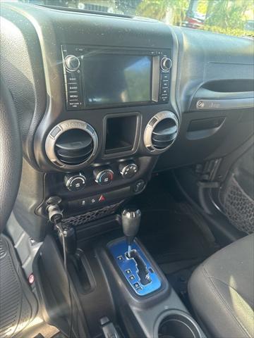 used 2016 Jeep Wrangler Unlimited car, priced at $14,988