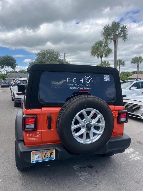 used 2023 Jeep Wrangler car, priced at $25,988