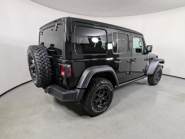 used 2023 Jeep Wrangler 4xe car, priced at $33,899