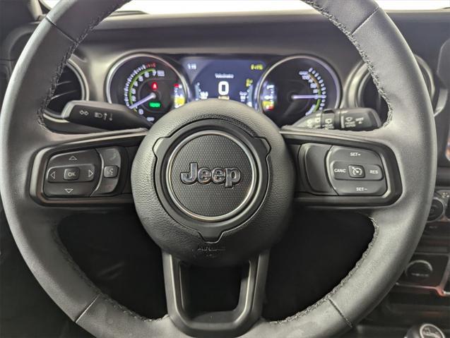 used 2023 Jeep Wrangler 4xe car, priced at $33,899