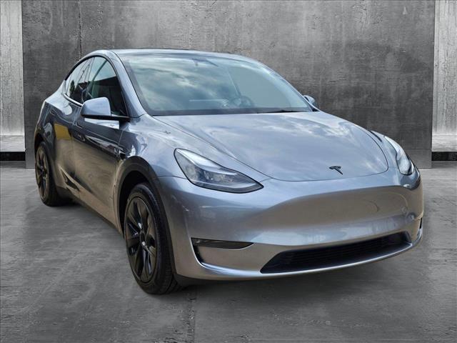 used 2025 Tesla Model Y car, priced at $40,295
