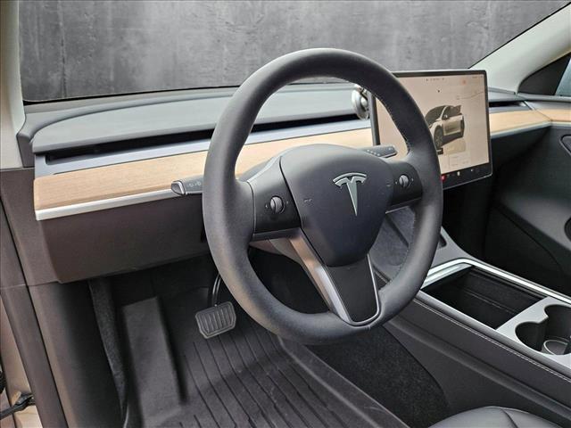 used 2025 Tesla Model Y car, priced at $40,295