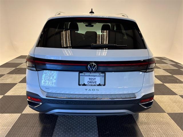 new 2025 Volkswagen Taos car, priced at $29,498