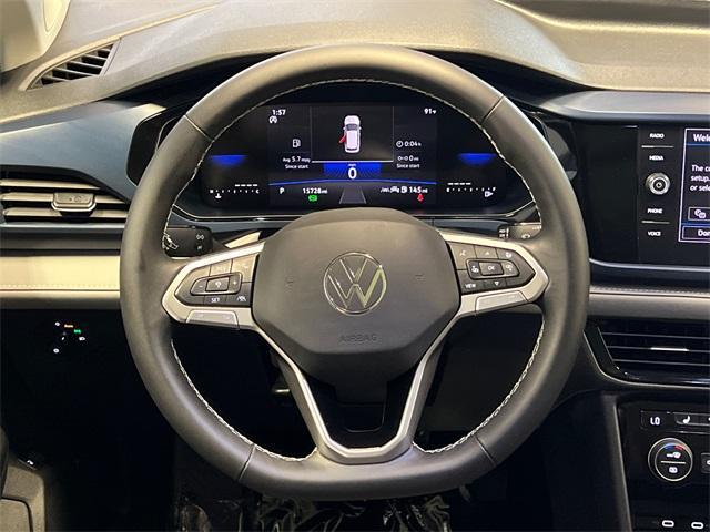 used 2024 Volkswagen Taos car, priced at $26,797
