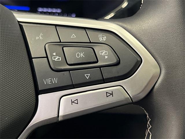 used 2024 Volkswagen Taos car, priced at $25,197