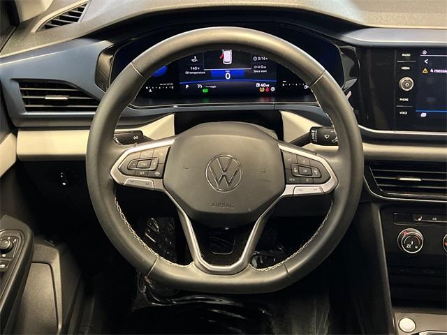 used 2022 Volkswagen Taos car, priced at $18,897
