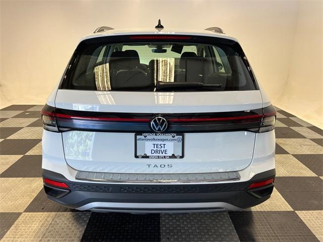 new 2025 Volkswagen Taos car, priced at $26,054