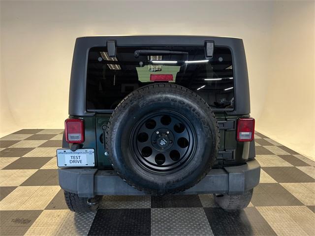 used 2011 Jeep Wrangler Unlimited car, priced at $11,997