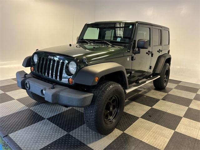 used 2011 Jeep Wrangler Unlimited car, priced at $11,997