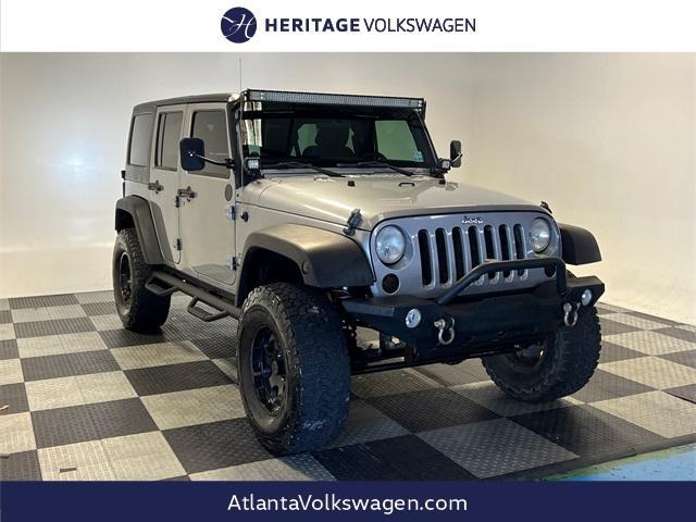 used 2013 Jeep Wrangler Unlimited car, priced at $14,997