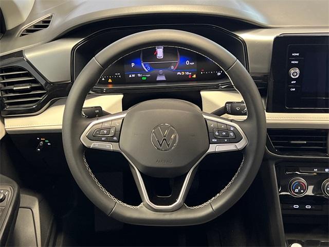 new 2025 Volkswagen Taos car, priced at $26,153