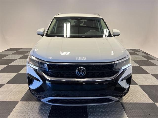 used 2023 Volkswagen Taos car, priced at $22,497