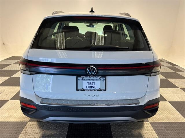 new 2025 Volkswagen Taos car, priced at $26,054