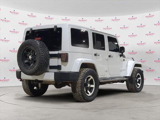 used 2012 Jeep Wrangler Unlimited car, priced at $13,841