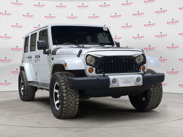 used 2012 Jeep Wrangler Unlimited car, priced at $13,841