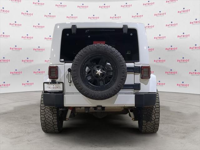 used 2012 Jeep Wrangler Unlimited car, priced at $13,841