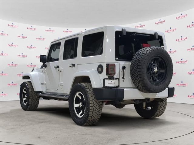 used 2012 Jeep Wrangler Unlimited car, priced at $13,841