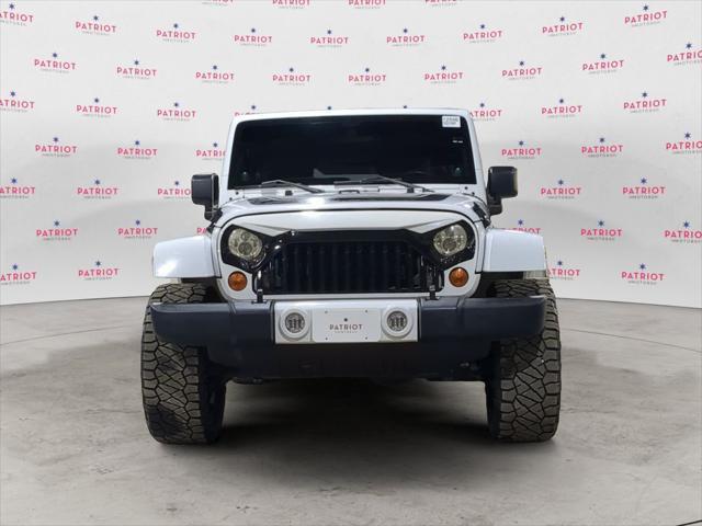 used 2012 Jeep Wrangler Unlimited car, priced at $13,841