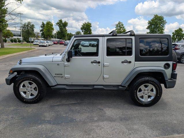 used 2012 Jeep Wrangler Unlimited car, priced at $13,999