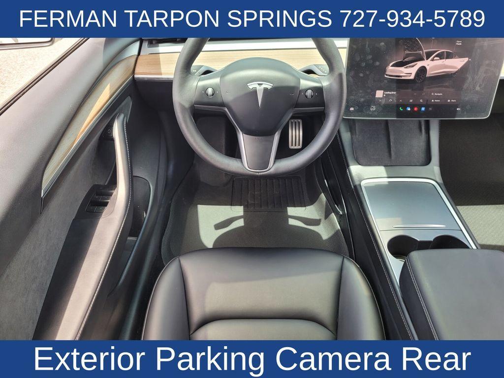 used 2023 Tesla Model 3 car, priced at $30,000