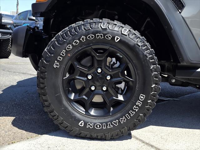 used 2023 Jeep Wrangler 4xe car, priced at $33,900