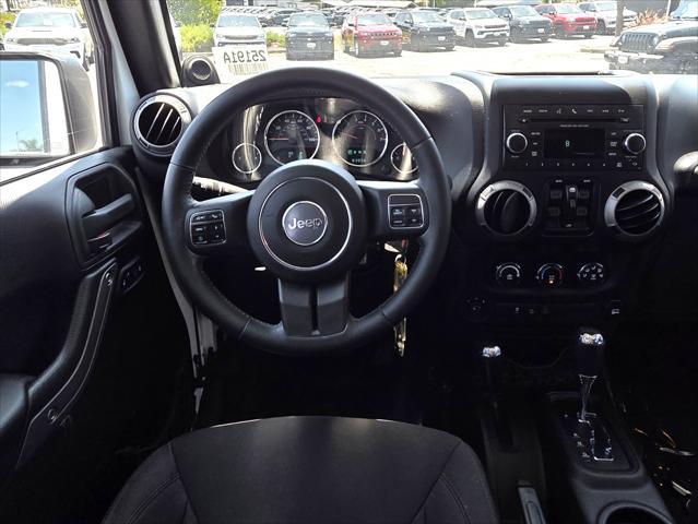 used 2014 Jeep Wrangler Unlimited car, priced at $24,900