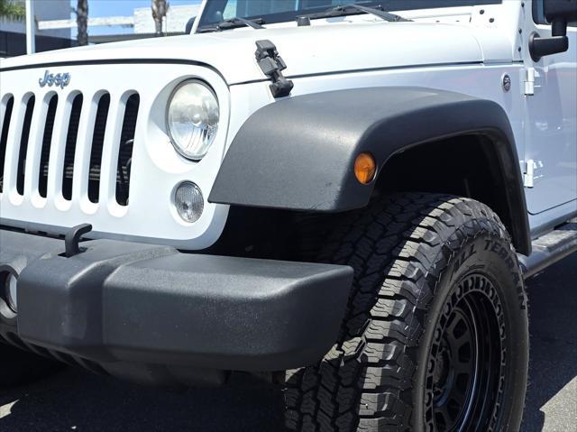 used 2014 Jeep Wrangler Unlimited car, priced at $24,900