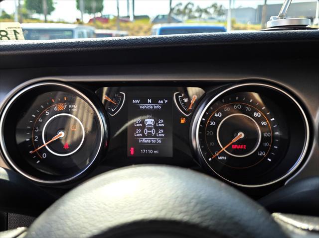 used 2023 Jeep Wrangler car, priced at $30,900
