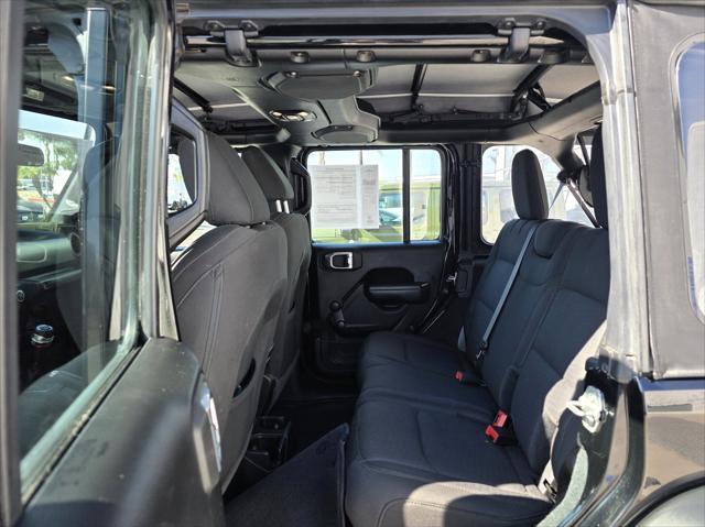 used 2023 Jeep Wrangler car, priced at $30,900