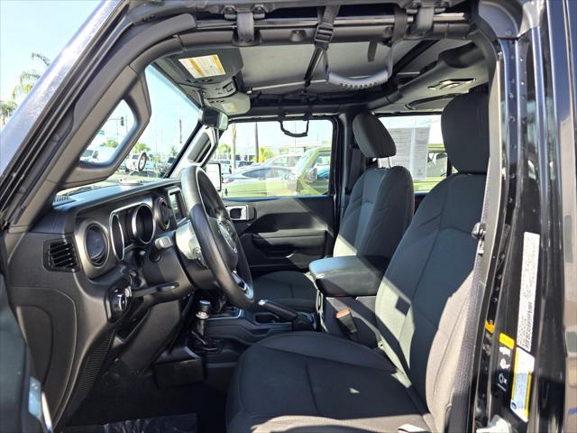 used 2023 Jeep Wrangler car, priced at $30,900