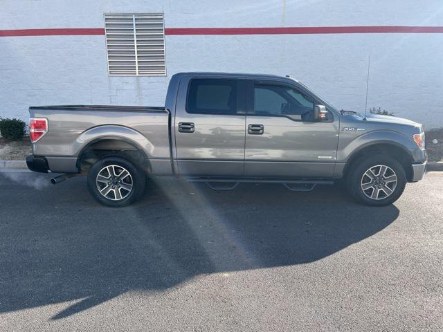 used 2014 Ford F-150 car, priced at $18,000