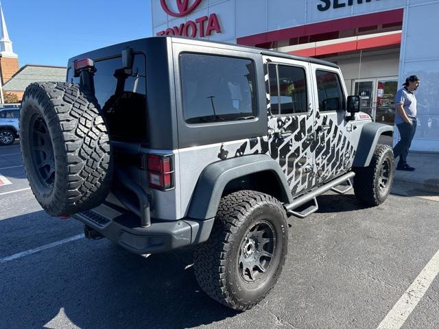 used 2014 Jeep Wrangler Unlimited car, priced at $23,500